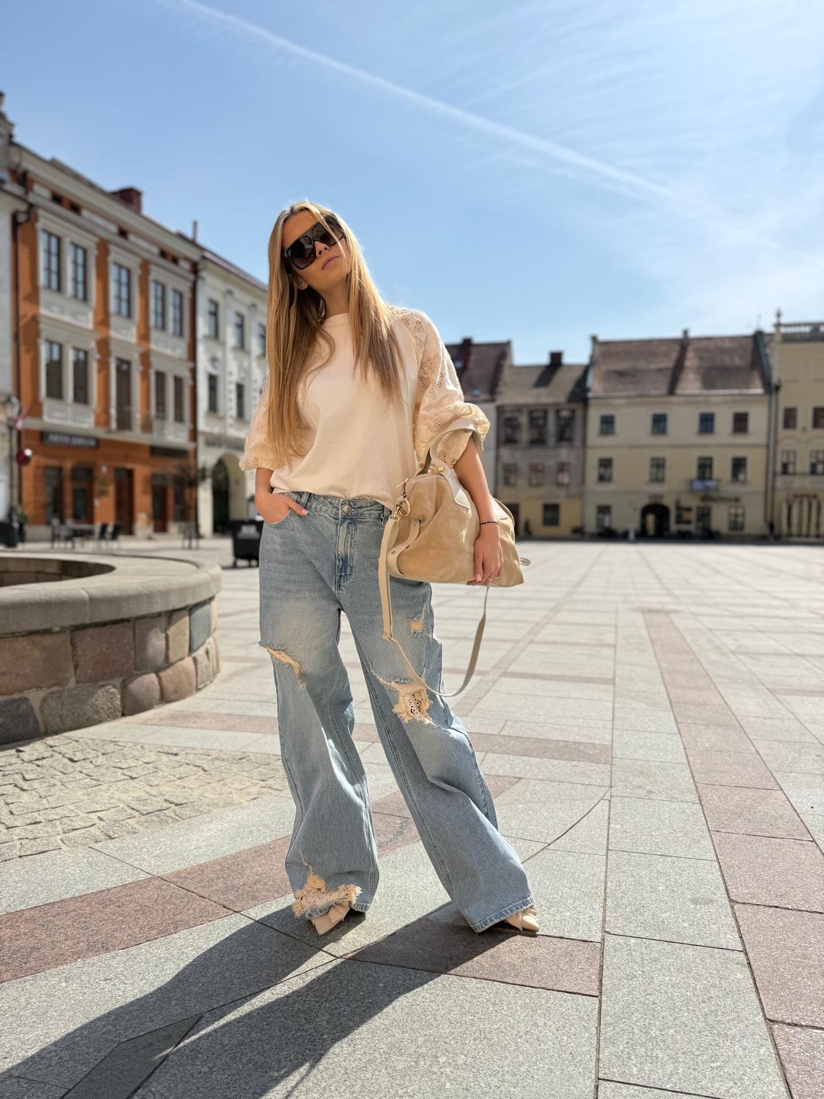 Jeansy wide leg z przetarciami