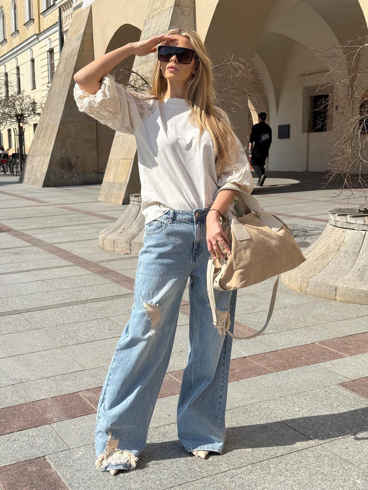 Jeansy wide leg z przetarciami